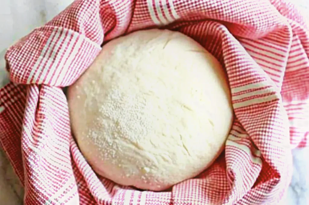 Versatile Crazy Dough used to make pizza, cinnamon rolls, and dinner rolls.