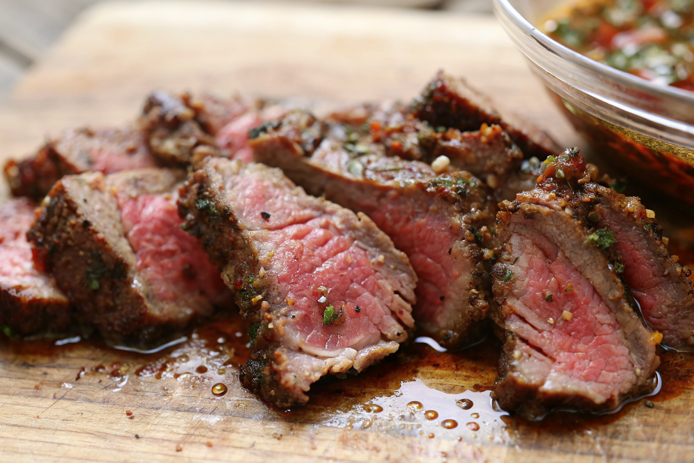 Perfectly grilled steak with beautiful char marks and caramelized exterior from Best Steak Marinade in Existence recipe