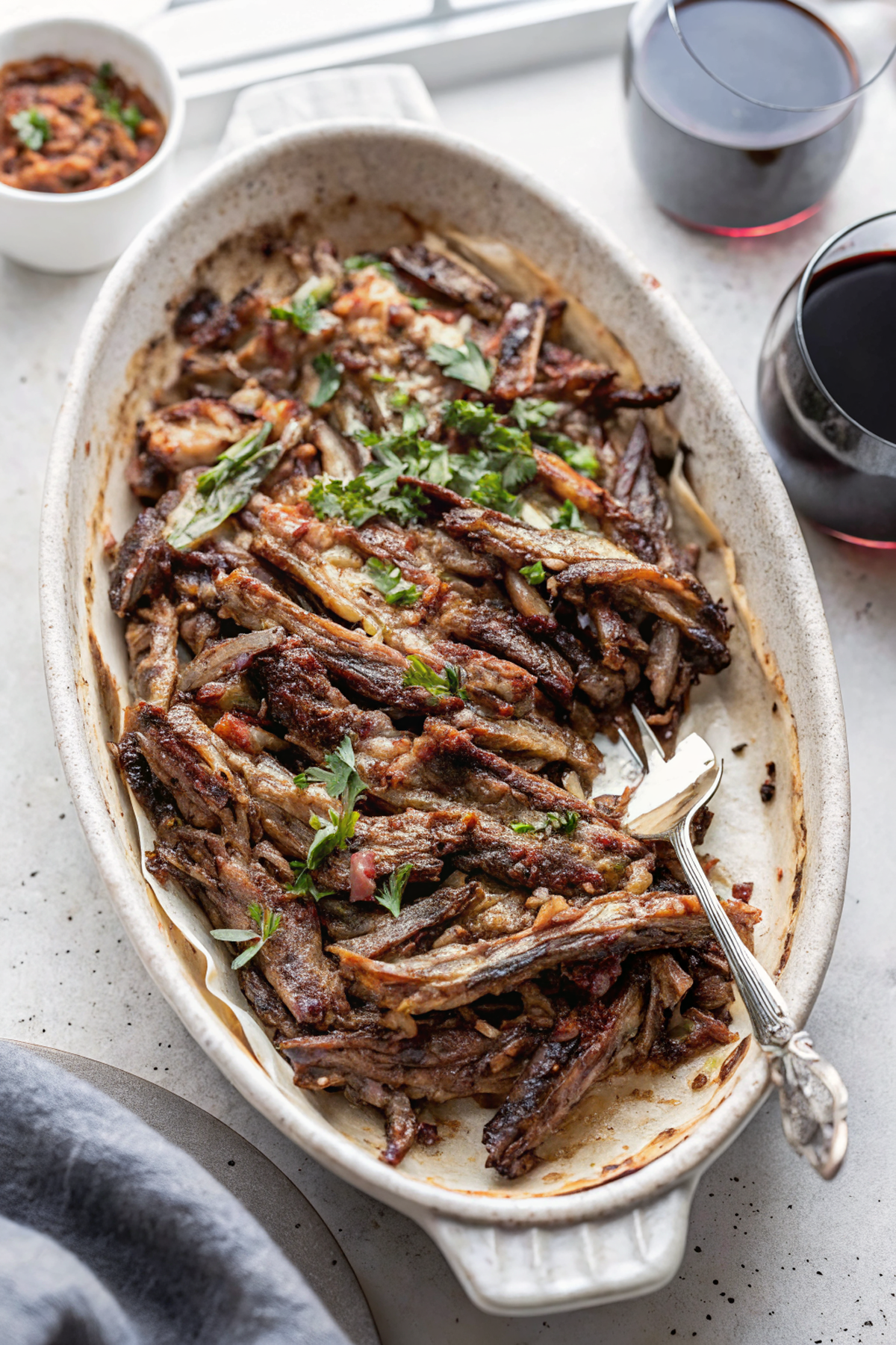 Perfectly braised and shredded beef chuck roast with golden caramelized onions and crispy edges, ready for tacos and sandwiches